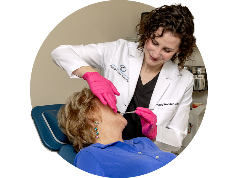 Dr. Wonder, oral & maxillofacial surgeon in Columbia, SC with oral pathology patient.