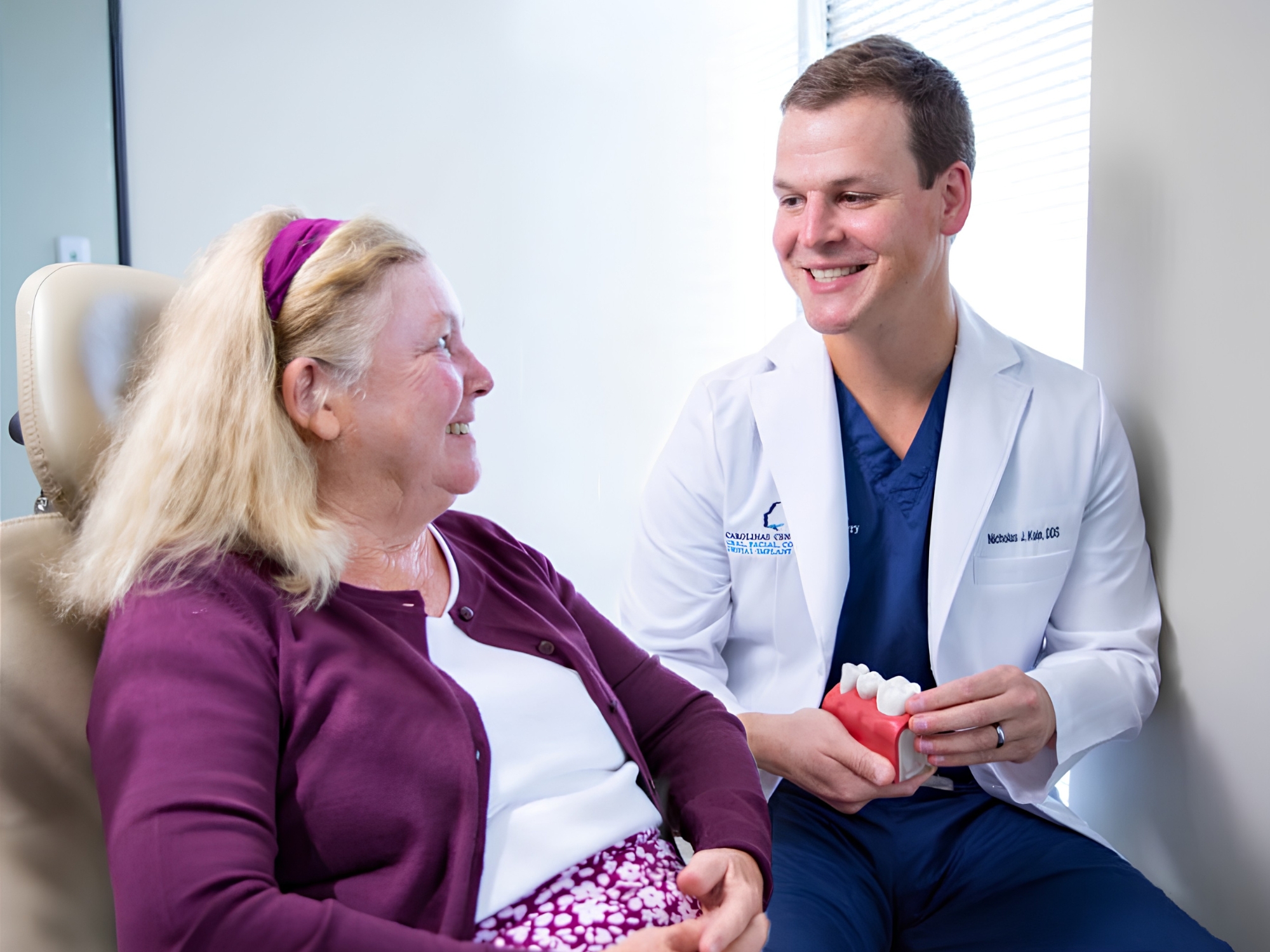 Dr. Kain, Oral and Maxillofacial Surgeon in Mooresville, NC with patient.