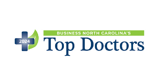 A logo featuring "Business North Carolina's 2024 Top Doctors," with a blue and green design, emphasizing healthcare recognition.