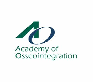 Logo of the Academy of Osseointegration with stylized letters "AO" in green and blue. Text beneath reads "Academy of Osseointegration."