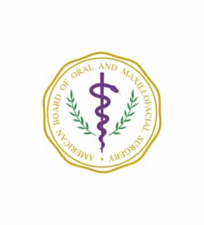 A logo featuring a purple caduceus symbol surrounded by green olive branches and an inscription: "American Board of Oral and Maxillofacial Surgery."