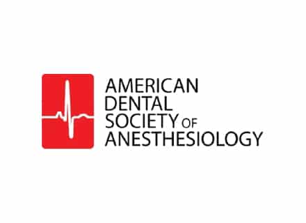 Logo of the American Dental Society of Anesthesiology featuring a red heart monitor line beside the organization's name in black text.