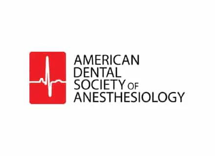 Logo of the American Dental Society of Anesthesiology featuring a red heart monitor line beside the organization's name in black text.