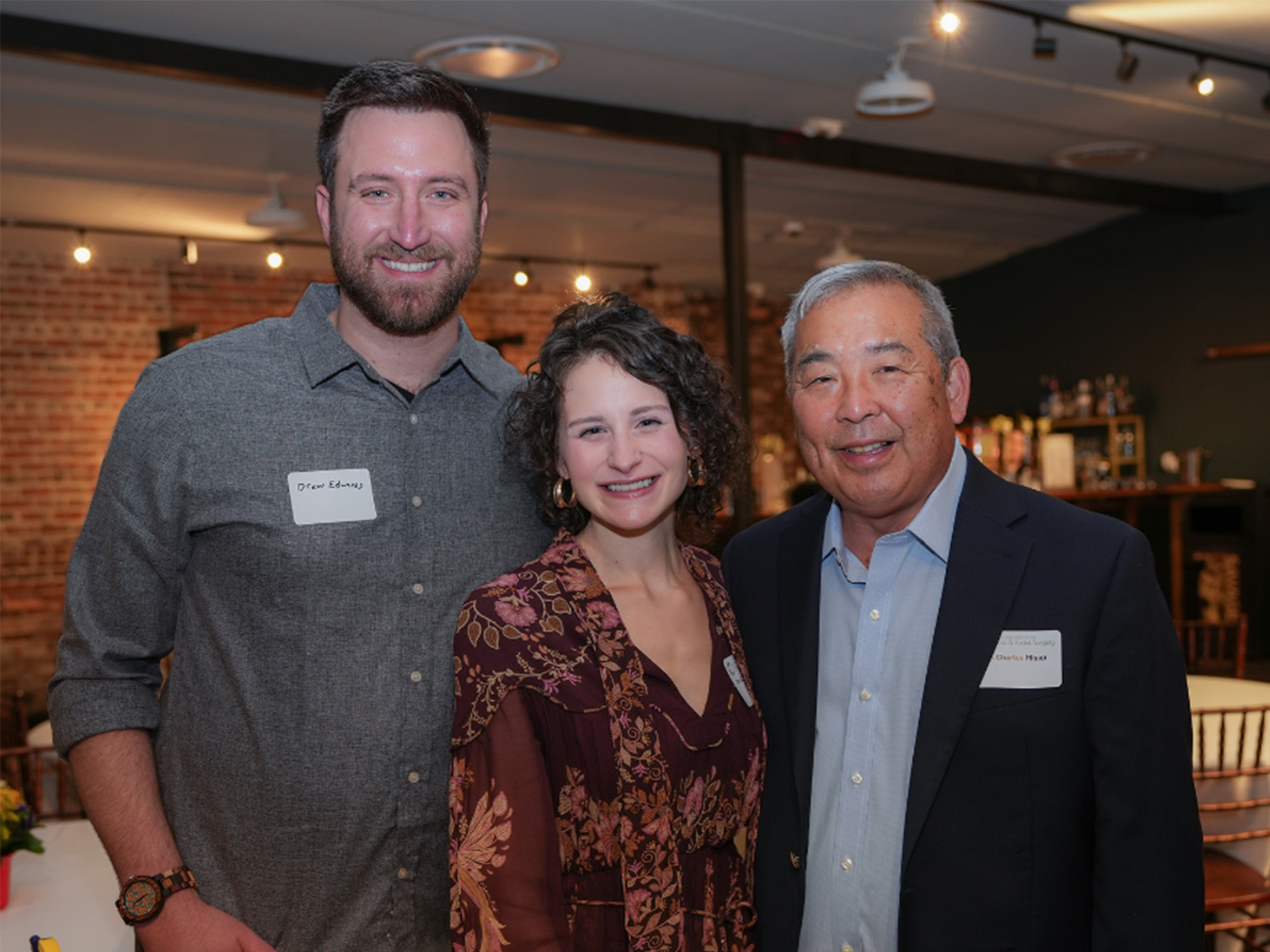 Dr. Kacey Wonder is smiling with family and friends