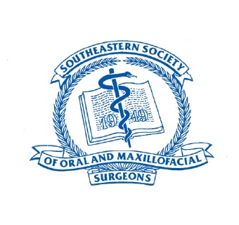 Logo of the Southeastern Society of Oral and Maxillofacial Surgeons features a caduceus over an open book encircled by laurel branches.