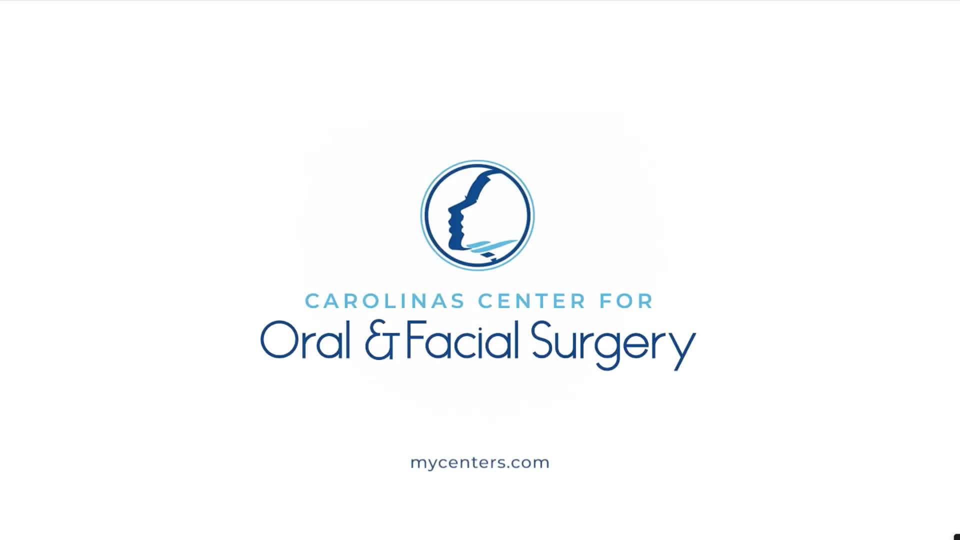Logo for Carolinas Center for Oral & Facial Surgery, featuring profile silhouette. Text includes "mycenters.com." Simple white and blue design.
