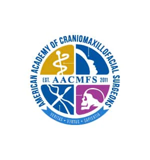 Circular emblem for American Academy of Craniomaxillofacial Surgeons, featuring medical and anatomical symbols with text: "Veritas," "Virtus," "Sapientia." Established 2011.