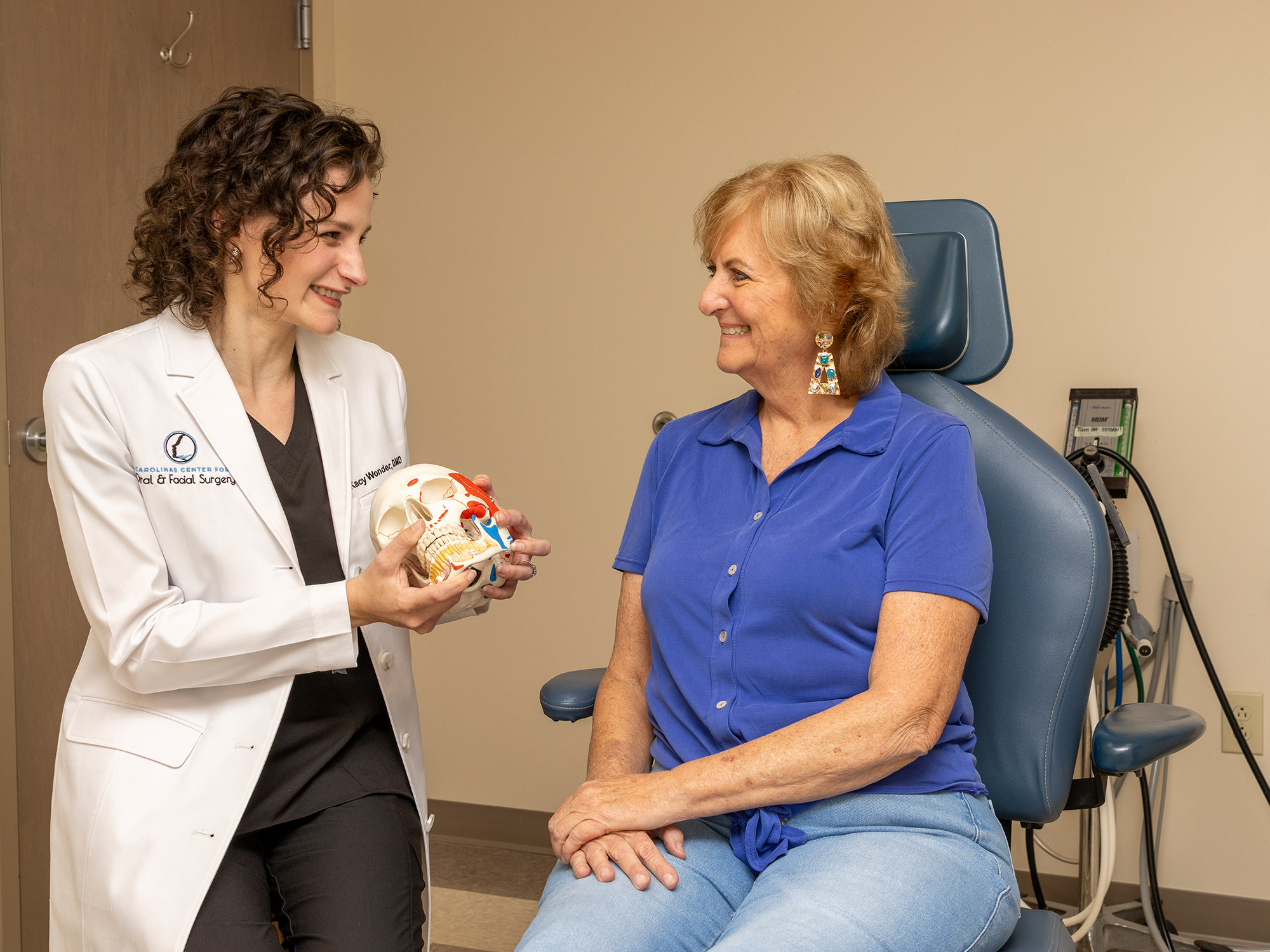 Dr. Kacy Wonder, Oral & Maxillofacial Surgeon in Columbia, SC, with patient